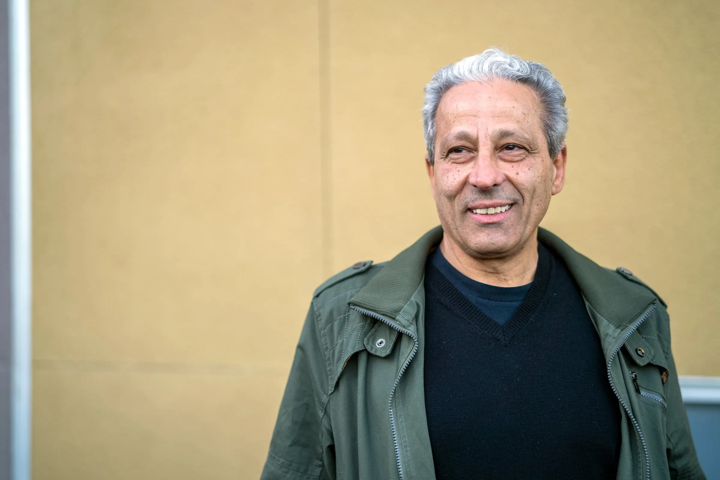 Photojournalist Ed Kashi smiles during a portrait session.
